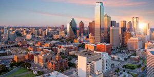 Dallas, Texas cityscape with blue sky at sunset