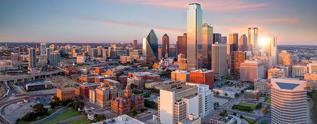 Dallas, Texas cityscape with blue sky at sunset